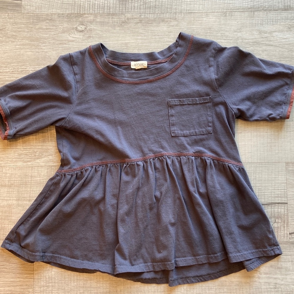 Navy blue peplum top with burgundy detail